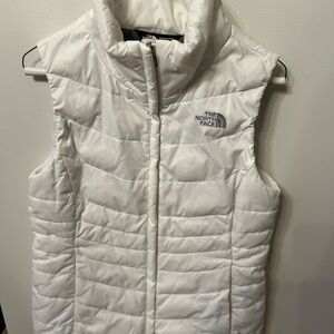The North Face Women's Quilted Vest in White 75% down filled. Size SP